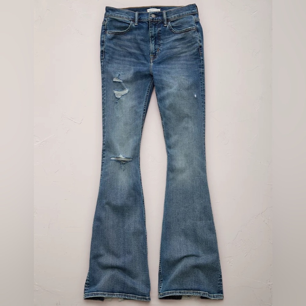 AE77 High-Waisted Flare Jean in Distressed Medium Wash. Size 8 have been hemmed.